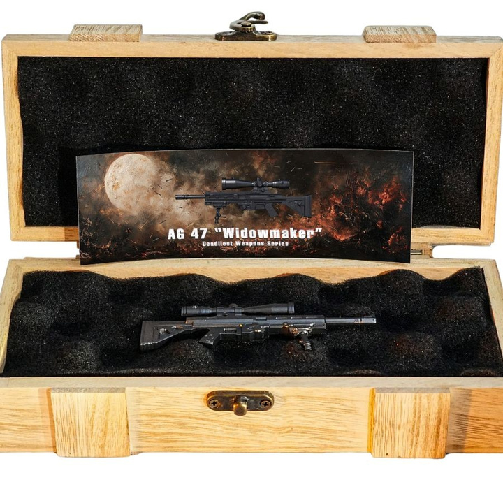 Kamerun Leghalálosabb fegyver - AG 47 Widowmaker Mystery Box (véletlenszerű érme a sorozatból) 2 uncia ezüst 2025 alakú érme